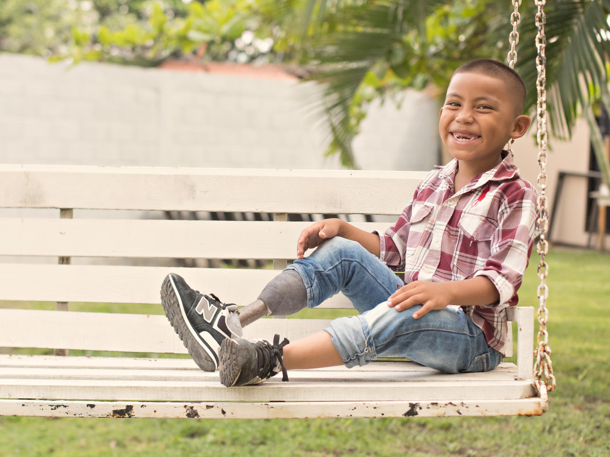 image of a boy on a swing