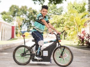 image of a boy on a bike